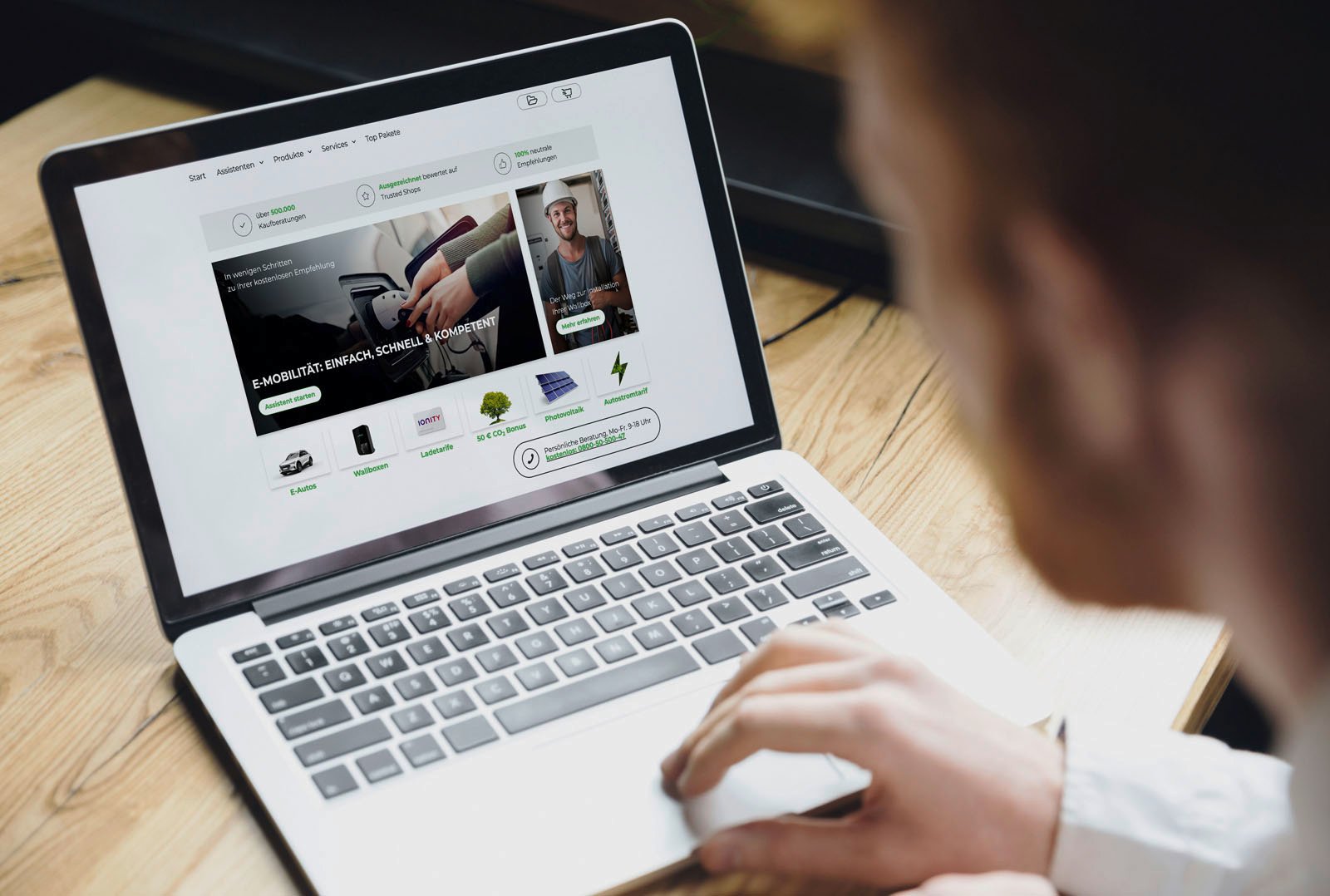 Person views the e-purchase advisor on a laptop in a modern working environment
